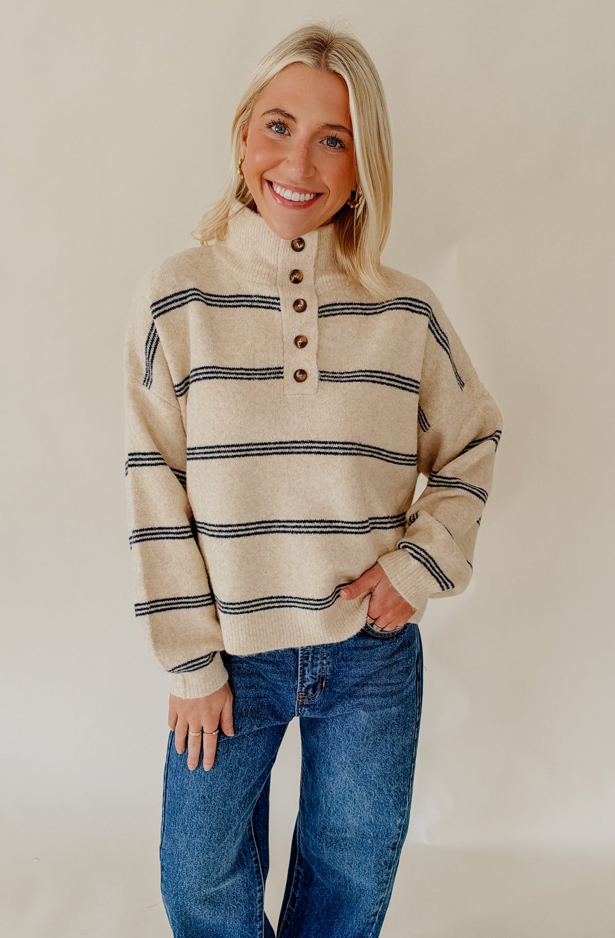 DRAW THE LINE MOCK NECK HENLEY SWEATER