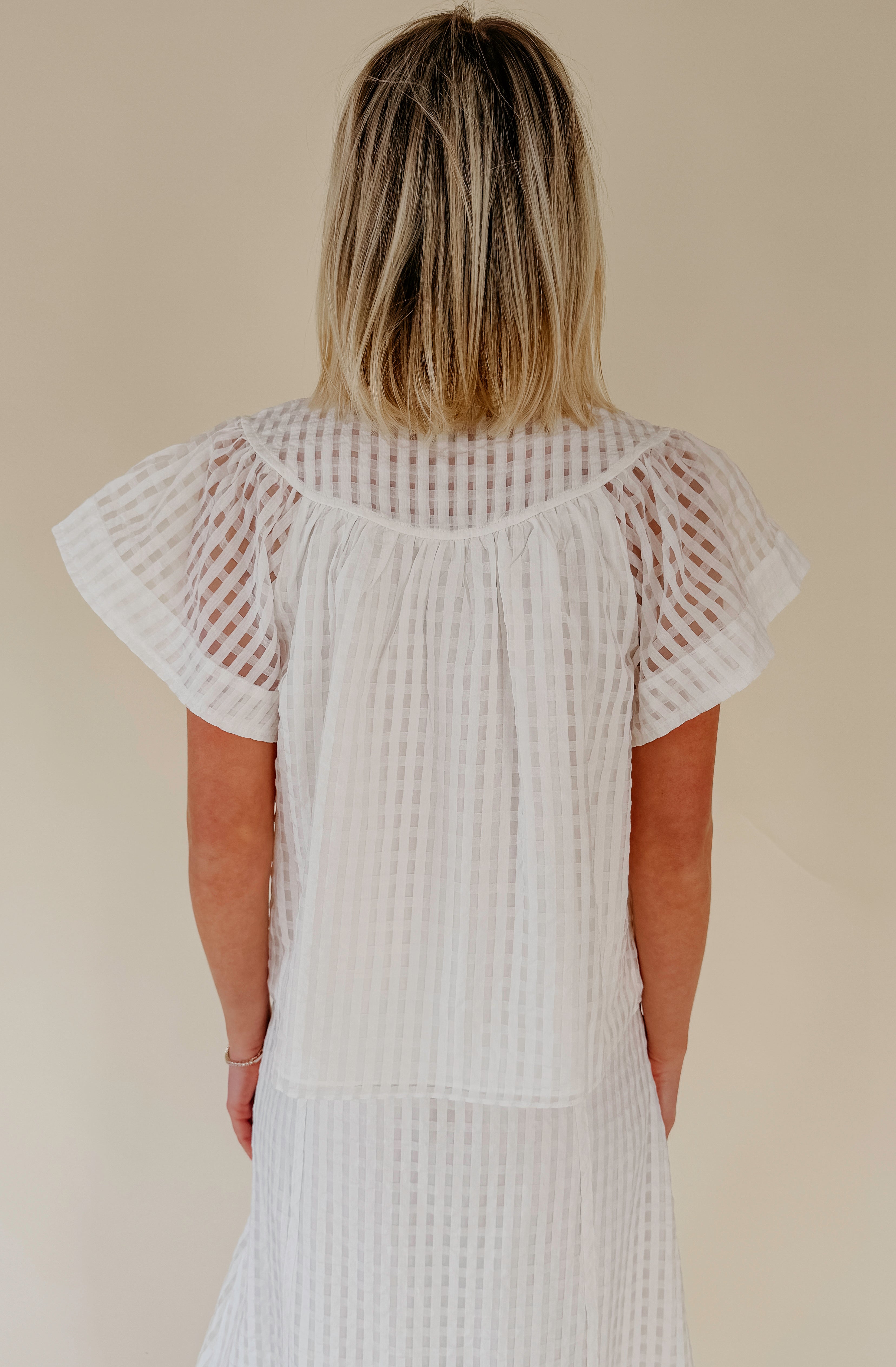 THE WHIT TEXTURED BLOUSE