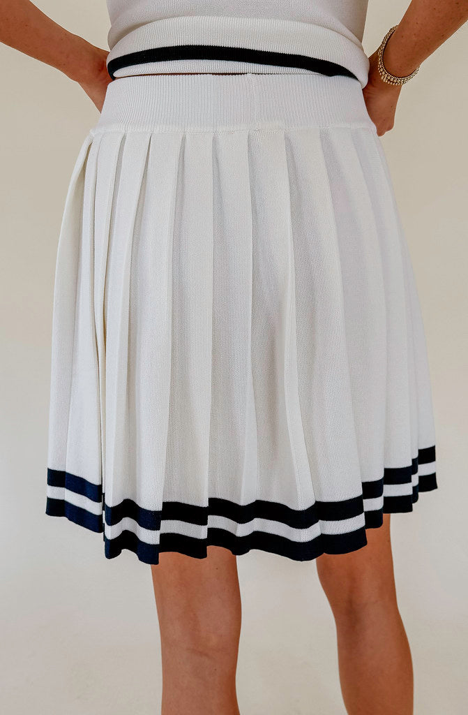 THE COURT PLEATED SKIRT