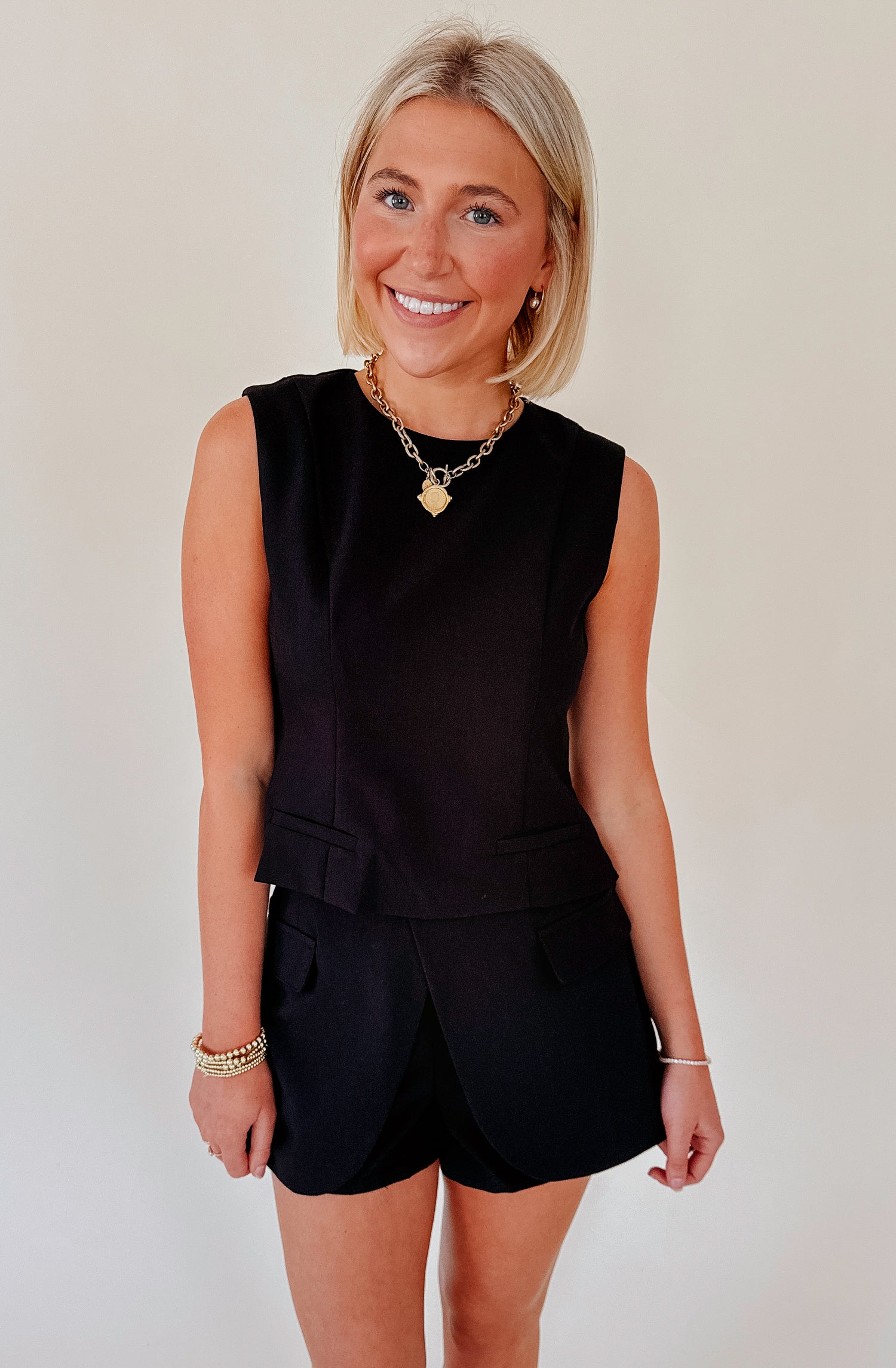 SHE MEANS BUSINESS TOP