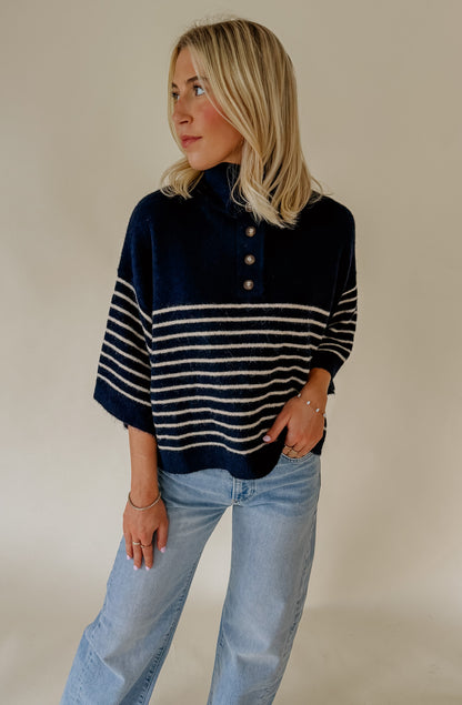 THE REAGAN STRIPED MOCK NECK SWEATER
