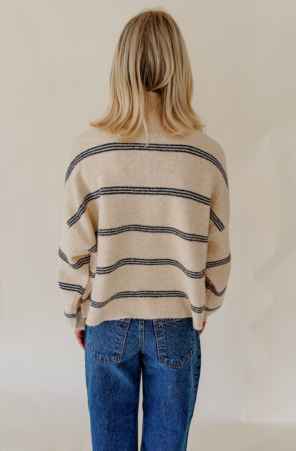 DRAW THE LINE MOCK NECK HENLEY SWEATER