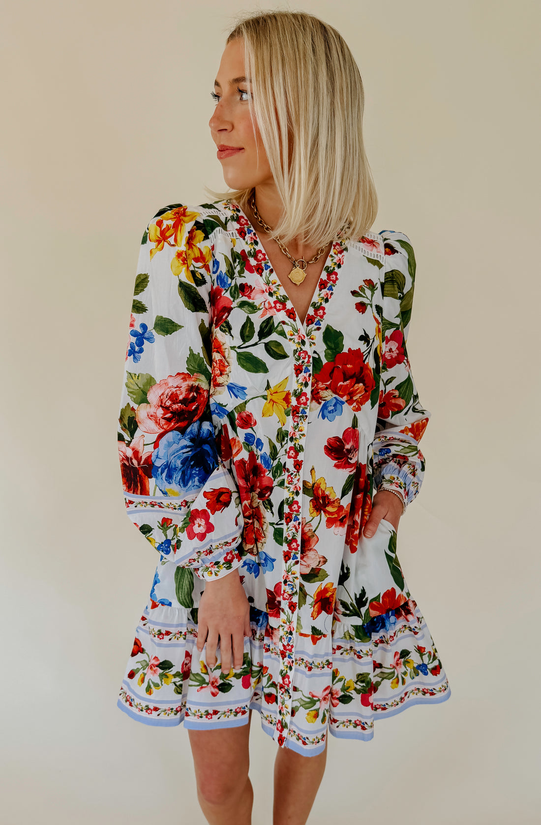 TELL ME MORE FLORAL MINI DRESS