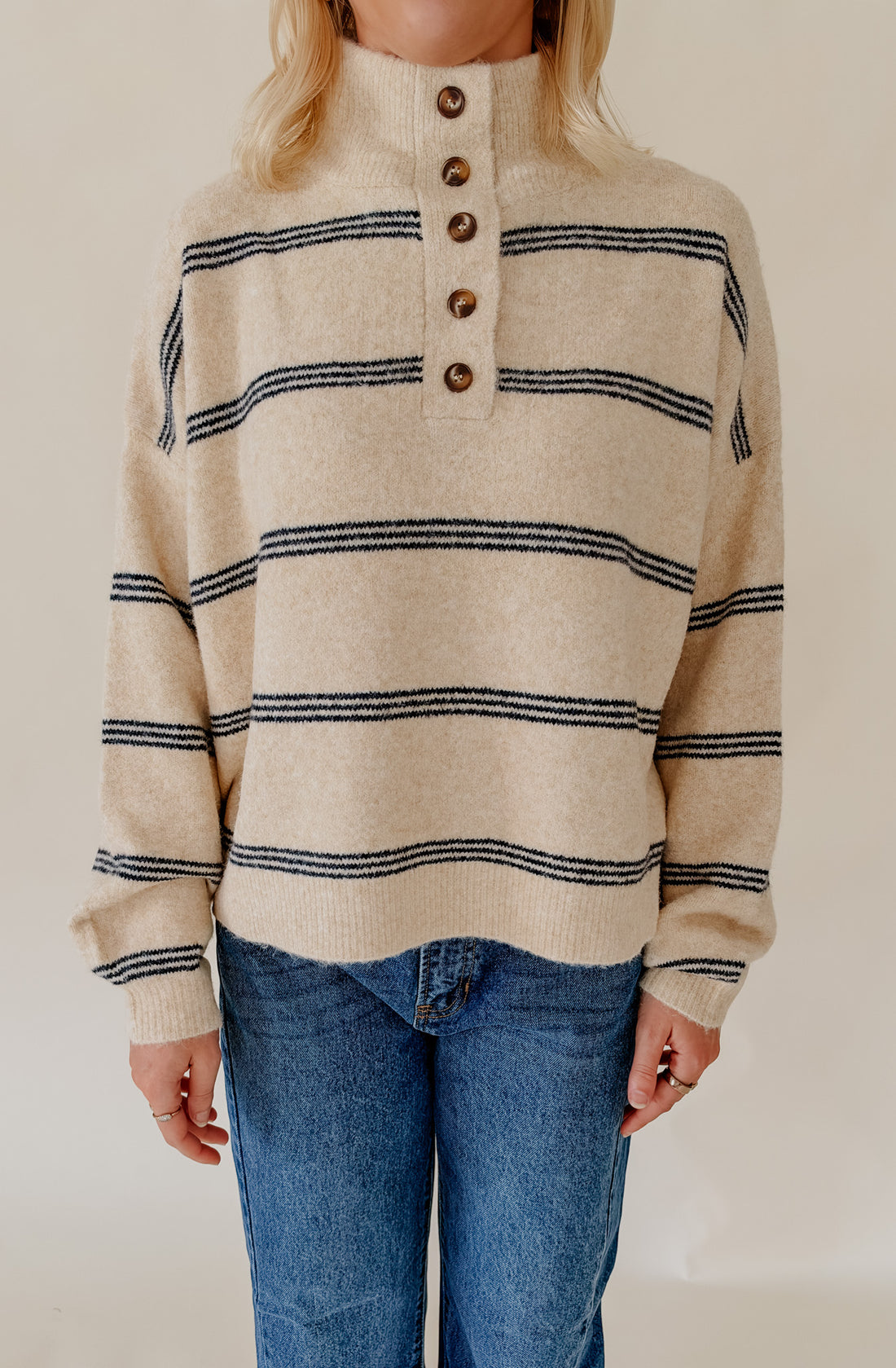 DRAW THE LINE MOCK NECK HENLEY SWEATER