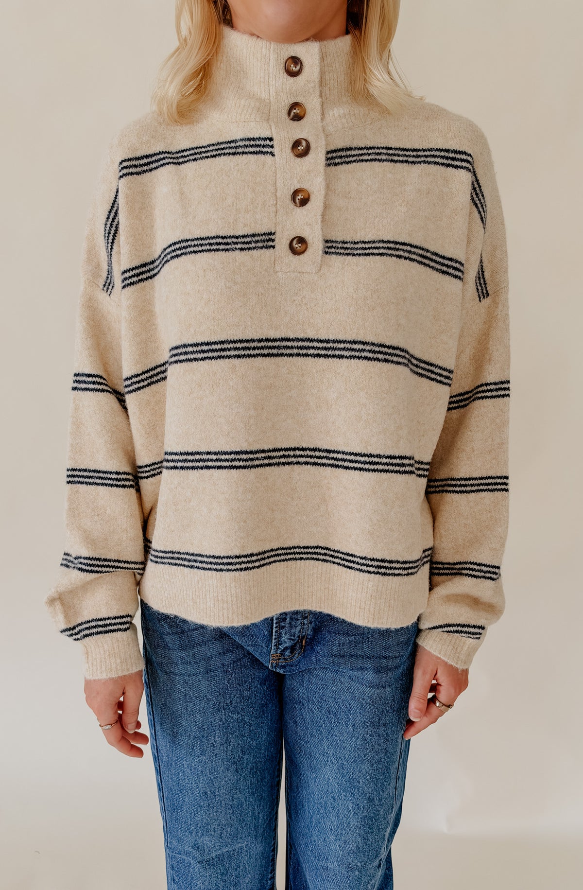 DRAW THE LINE MOCK NECK HENLEY SWEATER