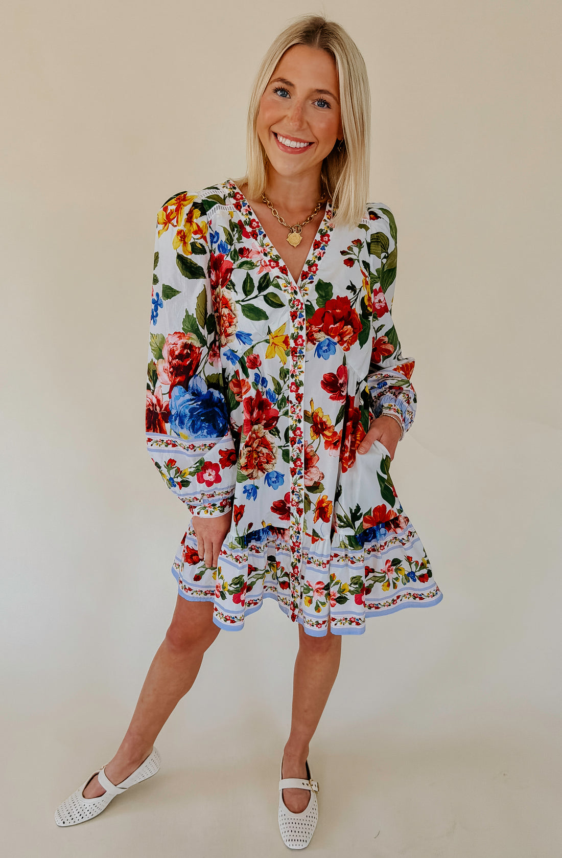 TELL ME MORE FLORAL MINI DRESS