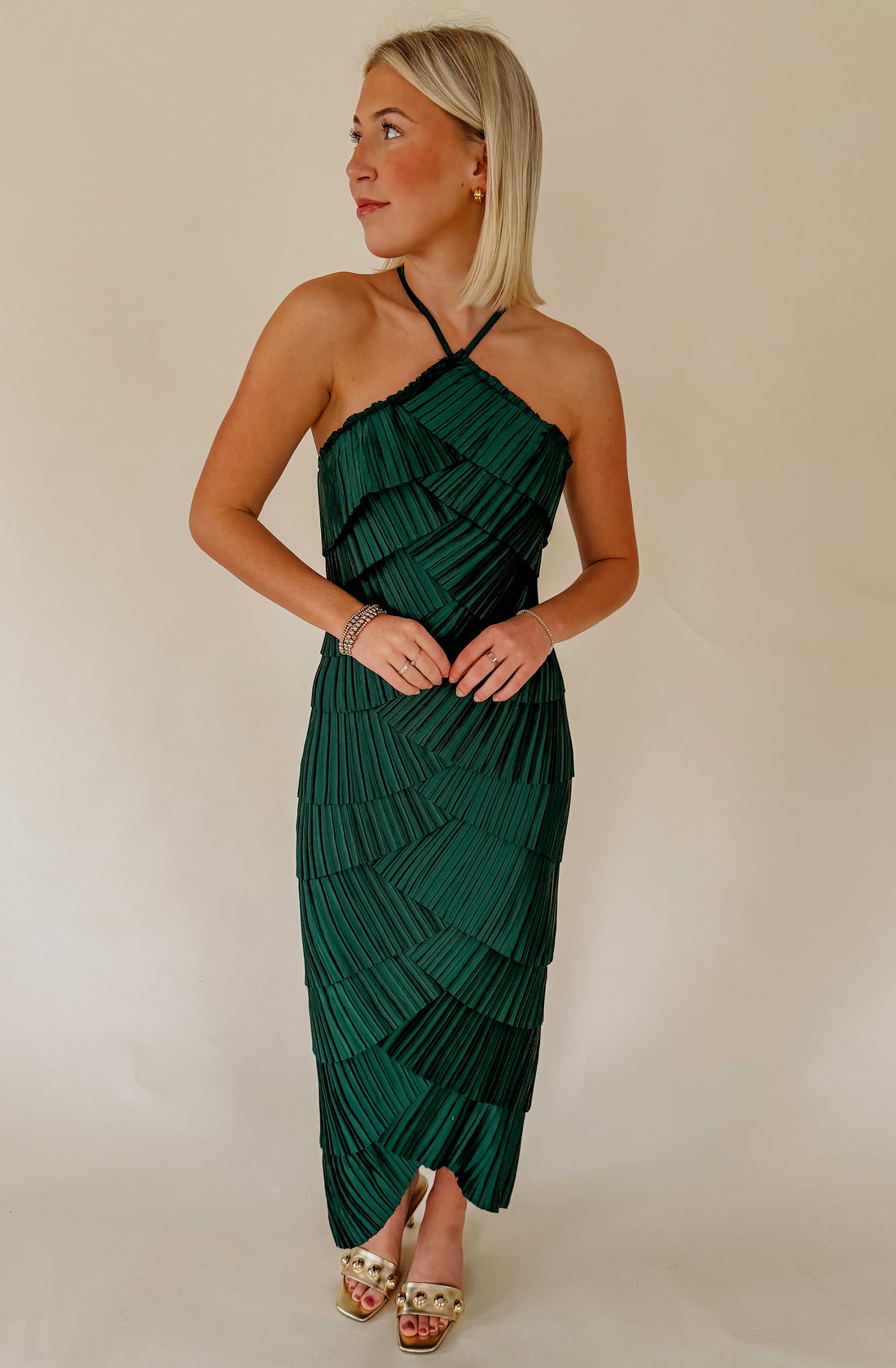 PLEATS AND THANK YOU HALTER DRESS