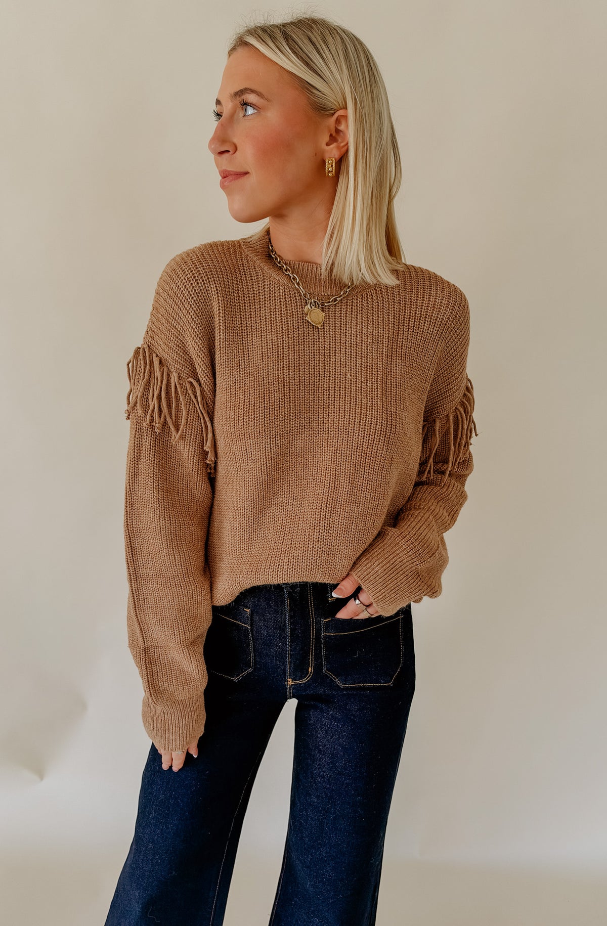 FOR THE FRINGE OF IT SWEATER