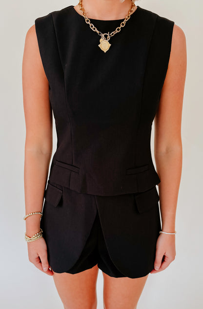 SHE MEANS BUSINESS TOP