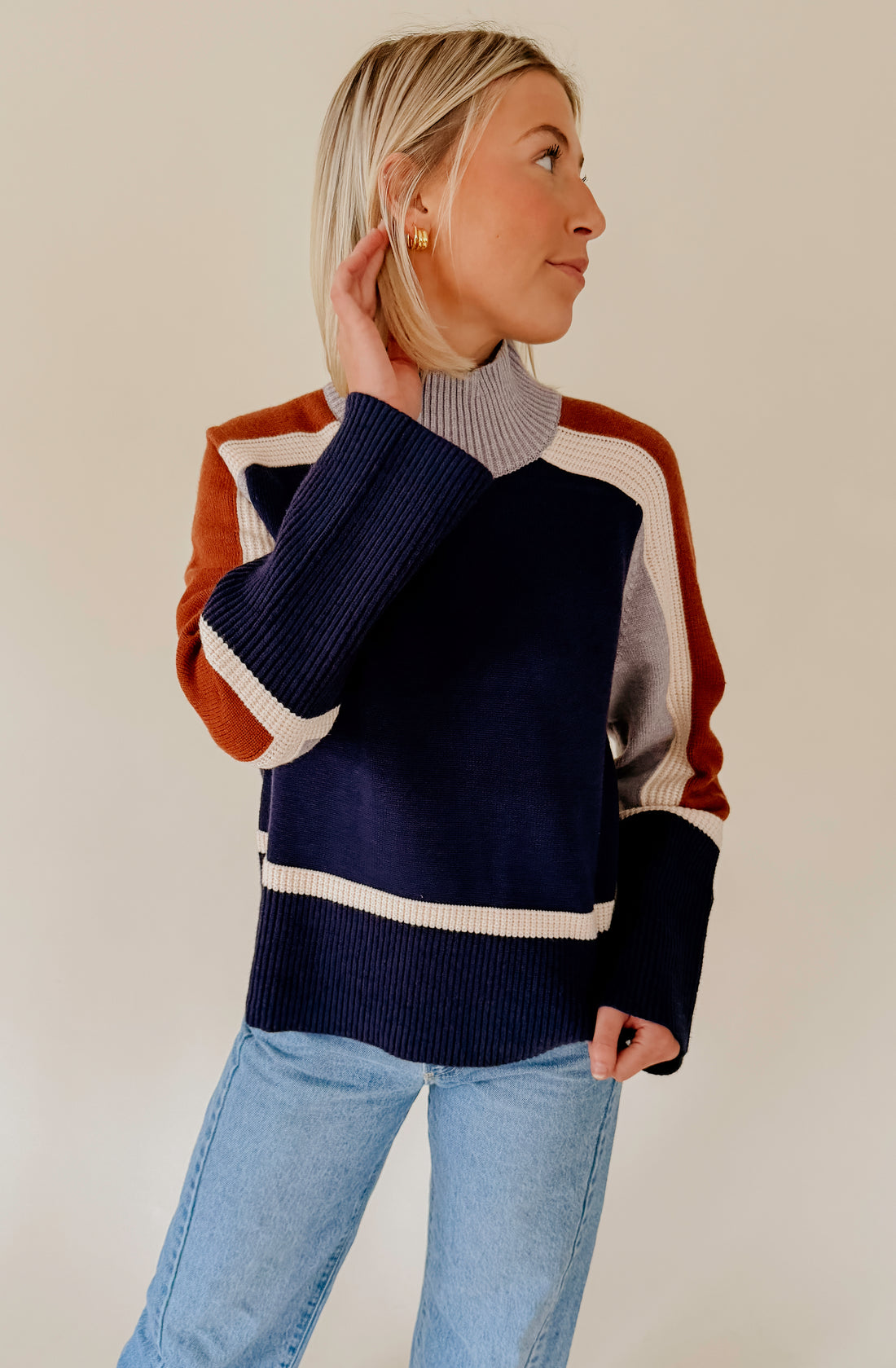 SPLIT DECISION MOCK NECK SWEATER