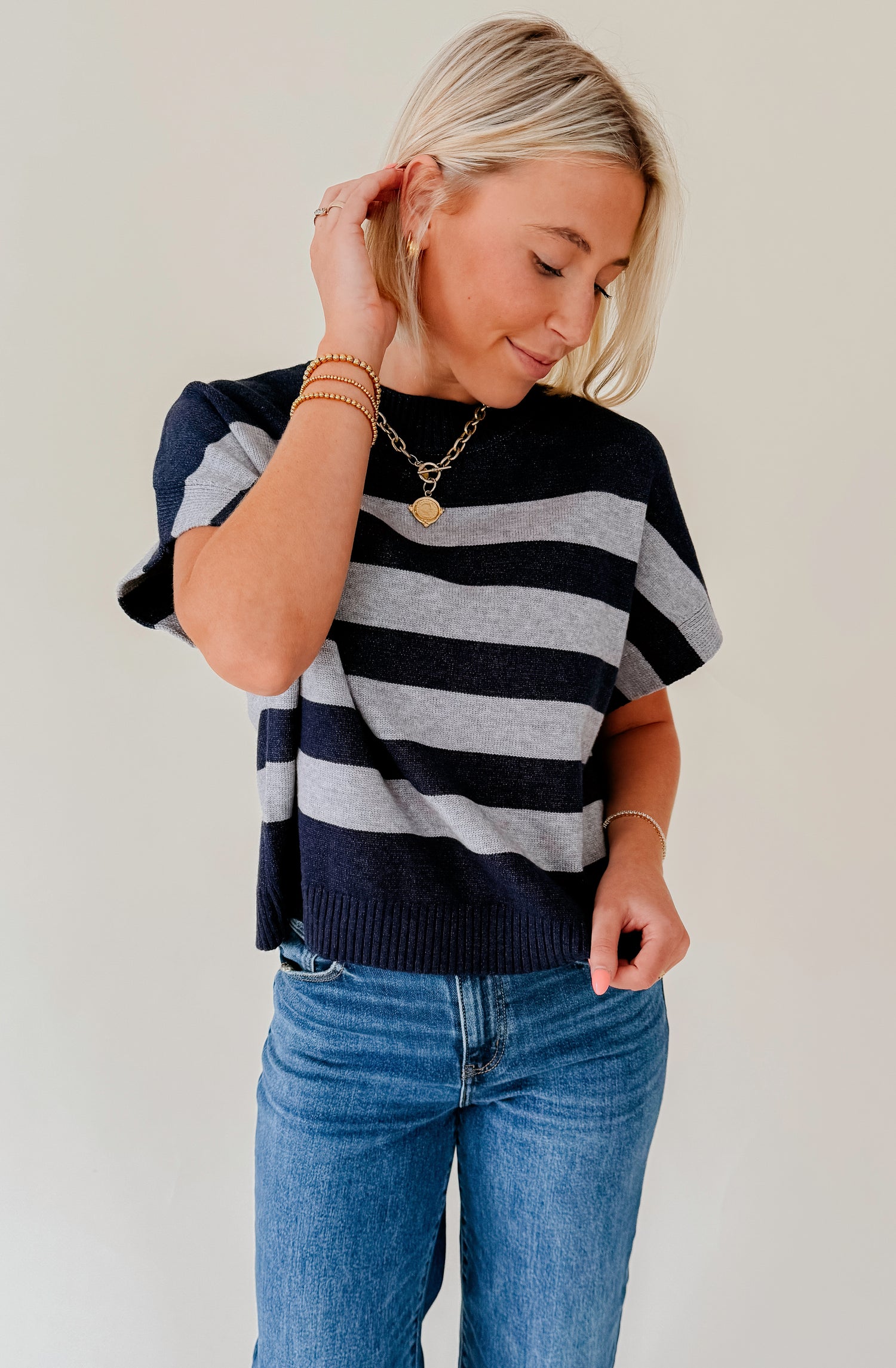 TELL ME LATER STRIPED SWEATER
