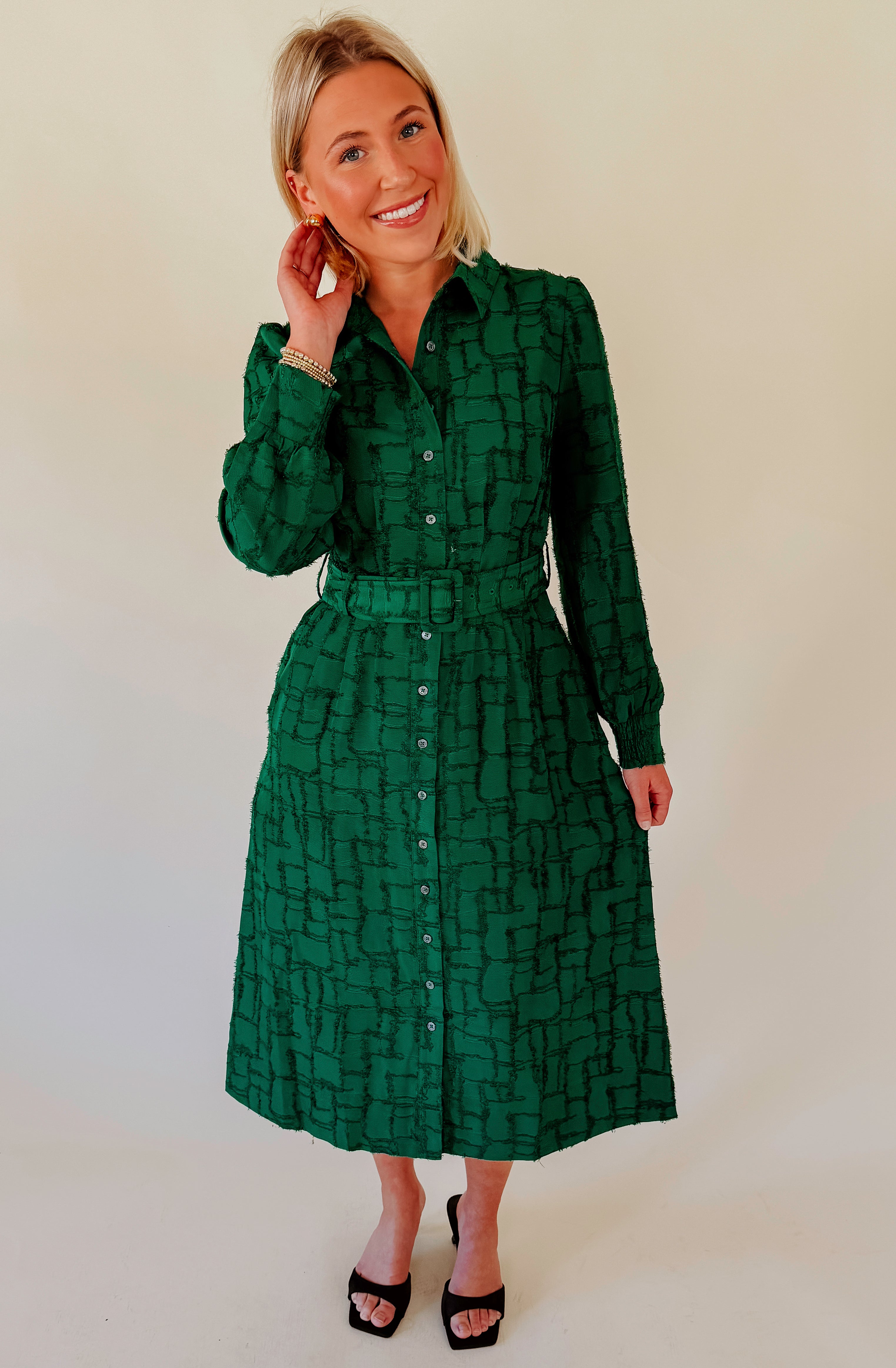 HOLIDAYS IN THE HEIGHTS BELTED MIDI DRESS