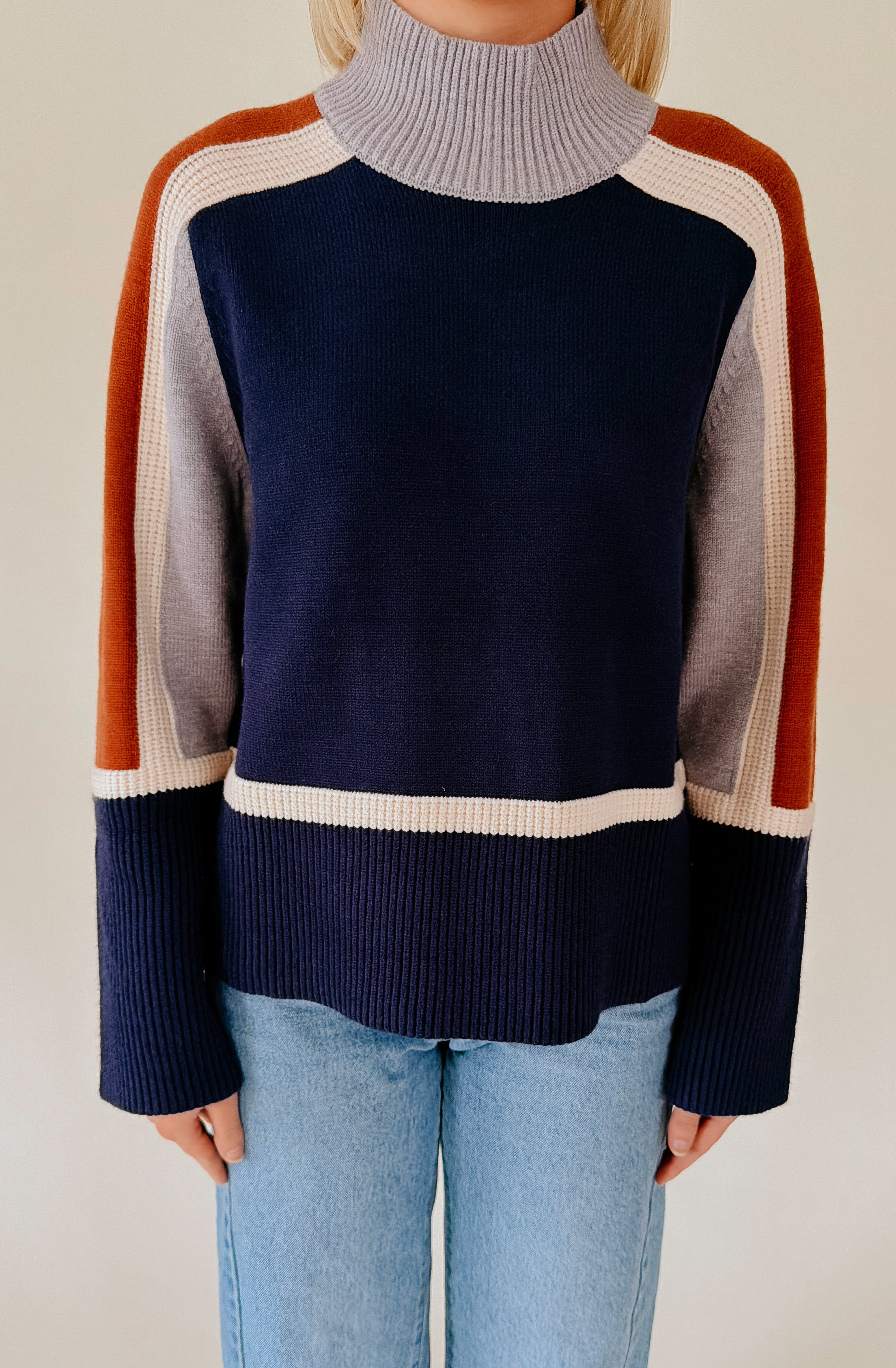 SPLIT DECISION MOCK NECK SWEATER