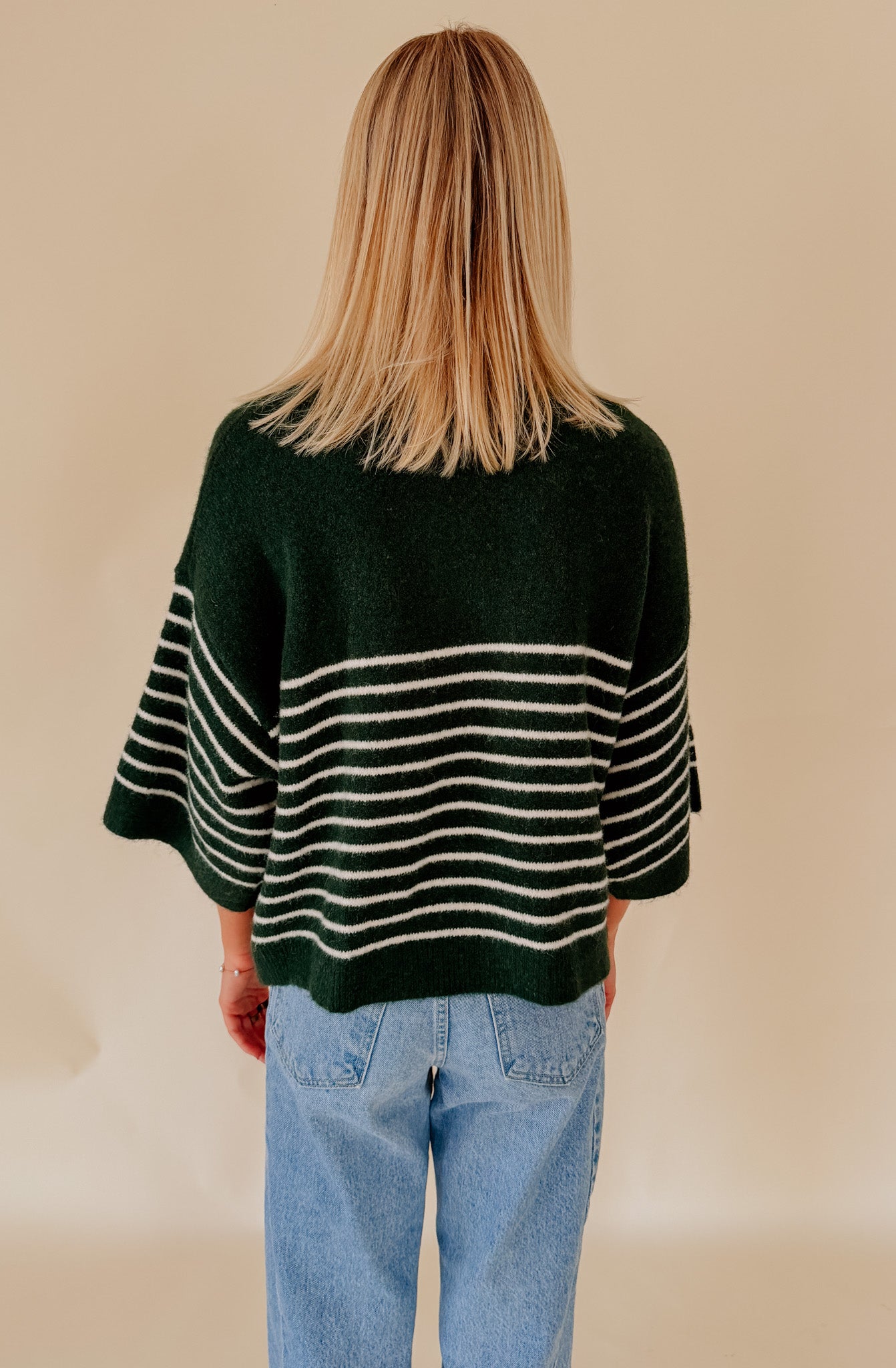 THE REAGAN STRIPED MOCK NECK SWEATER