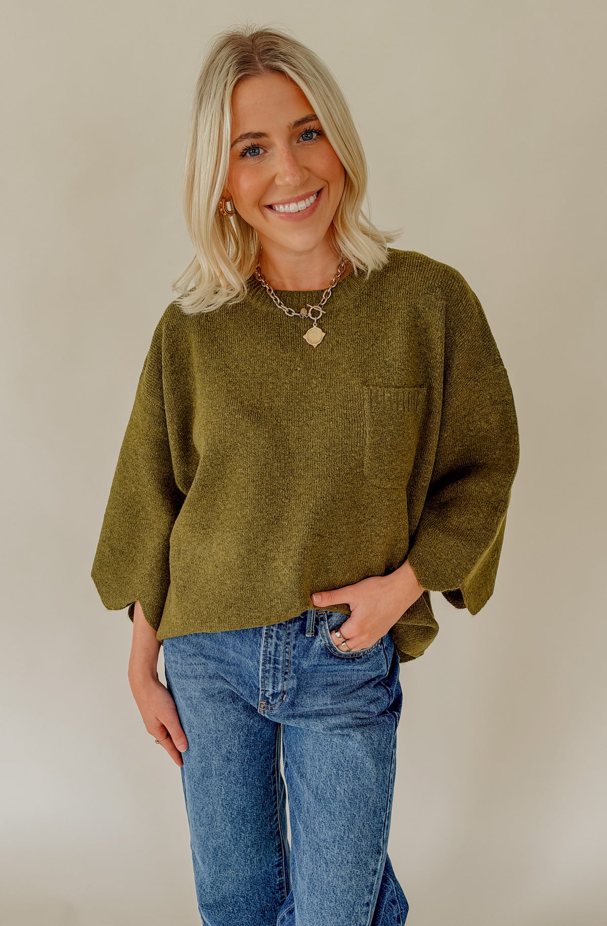 ON THE EDGE SCALLOPED SWEATER